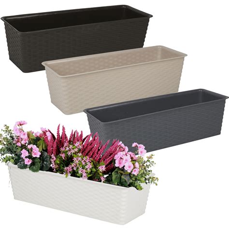 rectangular white containers for flowers